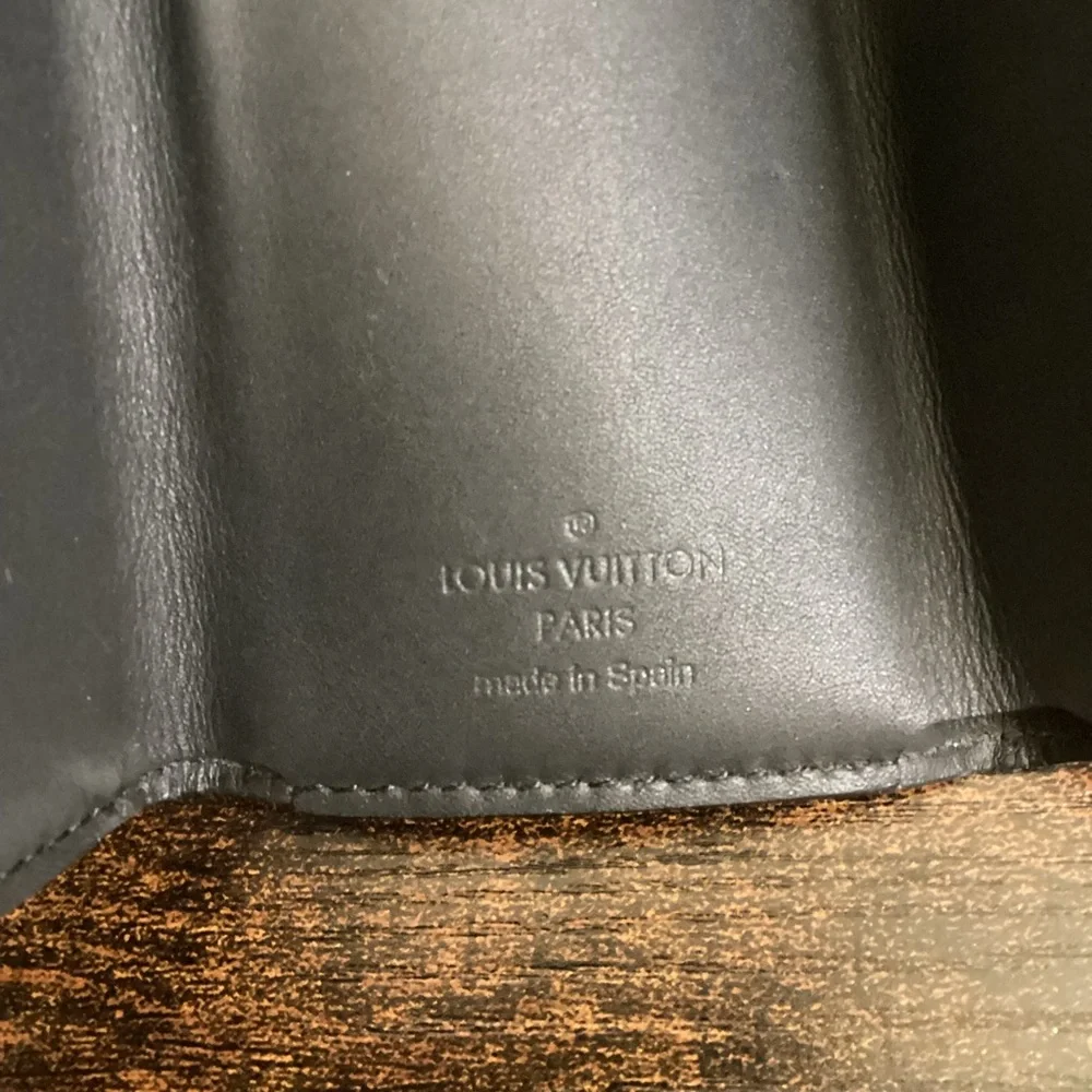 LV Discovery compact wallet Eclipse monogram tri fold